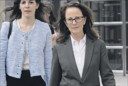  ?? Photos by mary Altaffer / Associated Press ?? Kathy russell, 61, leaves federal court in Brooklyn on friday, when she pleaded guilty to visa fraud. under her plea agreement she will spend six months to a year behind bars when she is sentenced in July.