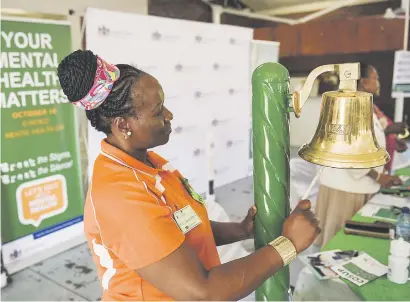  ?? Picture: Jacques Nelles ?? FOR WHOM THE BELL TOLLS. Visitors and staff ring a bell known as the Bell of Hope during an open day at the Weskoppies mental health hospital in Pretoria yesterday.