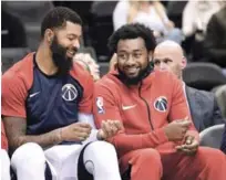  ?? AP ?? John Wall, a la derecha, y Markieff Morris, son parte del núcleo principal de los Wizards.