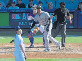  ?? Mark J. Terrill, The Associated Press ?? Rockies first baseman Ian Desmond watches his solo home run off Los Angeles Dodgers starting pitcher Kenta Maeda during the fifth inning Saturday in Los Angeles.
