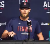  ?? Tony Gutierrez / Associated Press ?? Red Sox pitcher Chris Sale responds to questions during a news conference before practice in Houston on Thursday.