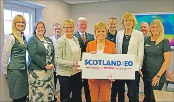  ??  ?? First Minister Nicola Sturgeon with Auchrannie managing director Linda Johnston and the Auchrannie management team at the announceme­nt of the new Scotland for EO national body.