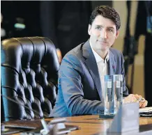  ?? ADRIAN WYLD /THE CANADIAN PRESS ?? Prime Minister Justin Trudeau, at the APEC Summit in Port Moresby, Papua New Guinea, Sunday, is on record as wanting to “manage” a transition away from fossil fuels dependence.