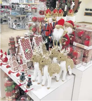  ?? DAVID ZALUBOWSKI/AP ?? This Macy’s in northeast Denver started setting up Christmas displays on Oct. 1. The retail giant says it wants to help holiday shoppers avoid crowds. Columnist Scott Maxwell is just ready for some holiday happiness.