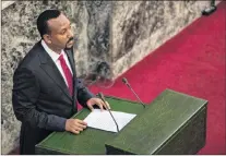  ?? AP PHOTO ?? Abiy Ahmed, the newly elected chair of the Ethiopian Peoples’ Revolution­ary Democratic Front (EPRDF) addresses Ethiopian lawmakers after he was sworn in as the country’s Prime Minister, Monday, April 2, 2018.