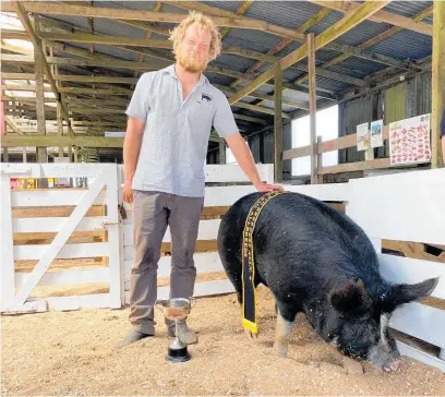  ?? Photos / Supplied ?? Jack Scott, 22, with his Berkshire pig Rata Glen Anne.