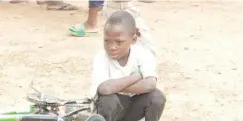  ?? ?? A child sitting at IDP camp Gwada, Shiroro LGA, Niger State