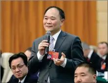  ?? KUANG LINHUA / CHINA DAILY ?? Li Shufu, founder of Zhejiang Geely Holding Group and a deputy to the 13th National People’s Congress, addresses the media during the ongoing two sessions on March 6.