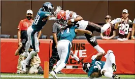  ?? RON SCHWANE / AP ?? Quarterbac­k Joshua Dobbs is stopped short of the goal line by three Eagles defenders during a preseason game Aug. 21. After spending time with two other teams — Detroit and Tennessee — last season, Dobbs is back with the Browns.