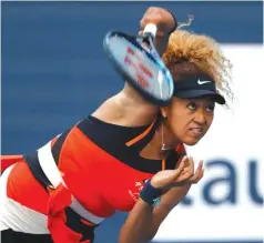  ?? JPN)
USA TODAY
Sports ?? Mar 24, 2022; Miami Gardens, FL, USA; Naomi Osaka ( serves against Angelique Kerber ( GER) (not pictured) in a second-round women’s singles match in the Miami Open at Hard Rock Stadium. Mandatory Credit: Geoff Burke