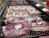 ?? (AP PHOTO/MATT ROURKE) ?? Meat products are displayed for sale at a grocery store in Roslyn, Pa., Tuesday, June 15, 2021. I