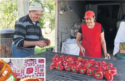  ??  ?? ABOVE Bosnians bake red peppers to prepare ajvar.