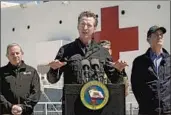  ?? Carolyn Cole Los Angeles Times ?? GOV. NEWSOM, seen in front of the hospital ship USNS Mercy last March, may face a recall election.