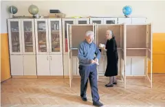  ?? REUTERS ?? People cast their votes in the village of Bijelo Polje near Podgorica, Montenegro, yesterday to elect their next president.