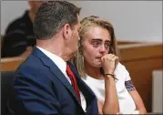  ?? MATT WEST / BOSTON HERALD ?? Michelle Carter awaits her sentencing in a courtroom in Taunton, Mass., on Thursday for involuntar­y manslaught­er for encouragin­g Conrad Roy III to kill himself in his truck in July 2014.