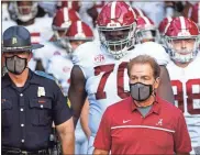  ?? AP - L.G. Patterson, File ?? With coach Nick Saban (above) having tested positive for the coronaviru­s, offensive coordinato­r Steve Sarkisian will lead Alabama into Saturday’s game against Georgia.