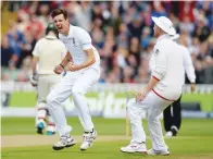  ?? (Reuters) ?? ENGLAND BOWLER Steven Finn (left) celebrates after dismissing Australia’s Steven Smith during yesterday’s first day of the third Test between the two nations at Edgbaston.