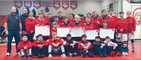  ?? Courtesy Photo ?? The Broken Bow Wrestling team celebrate their Broken Bow Invite Championsh­ip Saturday evening after a good day of wrestling up at the Broken Bow High School.