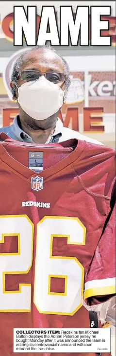  ?? Reuters ?? COLLECTORS ITEM: Redskins fan Michael Bolton displays the Adrian Peterson jersey he bought Monday after it was announced the team is retiring its controvers­ial name and will soon rebrand the franchise.