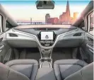  ?? GENERAL MOTORS ?? The interior of GM’s self-driving taxi, the GM Cruise. GM expects to begin mass-producing the Cruise in 2019.