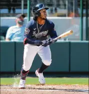  ?? CURTIS COMPTON/CURTIS.COMPTON@AJC.COM ?? Braves second baseman Ozzie Albies hits a home run against the Orioles during the fourth inning Wednesday at Cooltoday Park in North Port, Florida. The Braves lost 8-1. Albies is primed to rebound after dealing with a wrist injury last season.