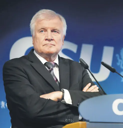  ??  ?? German Interior Minister and CSU Chairman Horst Seehofer attends a press conference at the headquarte­rs of the Christian Social Union (CSU), Munich, Oct. 15.