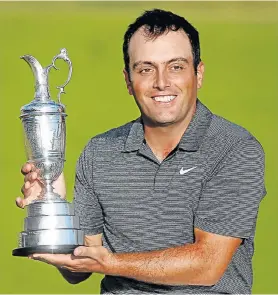  ?? Picture: ROSS KINNAIRD VIA GETTY IMAGES ?? WINNING TOUCH: Francesco Molinari basks in his British Open victory