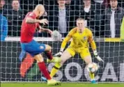  ??  ?? Czech Republic's Zdenek Ondrasek scores his side's second goal during the Euro Group A qualifying match against England.
AP