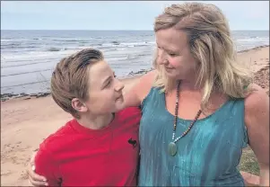 ?? SUBMITTED PHOTO ?? Beth Johnston and her son, Charlie Ross, are shown on the beach in Savage Harbour where they had the fright of their lives Saturday evening after getting caught in a rip current.