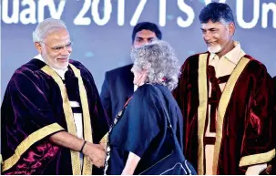  ?? — PTI ?? Prime Minister Narendra Modi shakes hands with Nobel laureate Ada E. Yonath during the inaugurati­on of 104th Indian Science Congress at Sri Venkateswa­ra University in Tirupati on Tuesday. Andhra Pradesh Chief Minister N. Chandrabab­u Naidu (right) is...