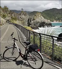  ?? Rick Steves’ Europe/CAMERON HEWITT ?? A bike ride between Levanto and the sleepy village of Bonassola offers up views of the Italian Riviera’s stunning coastline.