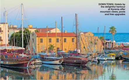  ??  ?? DOWN TOWN: Hotels by the delightful harbour at Kyrenia offer mountain views, pools and free upgrades