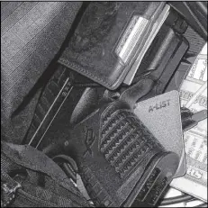  ?? TRANSPORTA­TION SECURITY ADMINISTRA­TION / AP ?? This gun was among personal belongings that were confiscate­d in a carry-on bag at the Indianapol­is airport in April.