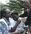  ??  ?? Grieving relatives of victims at a mortuary in Nairobi