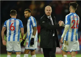  ?? Reuters ?? Sean Dyche, second from right, will not let Burnley get too far ahead of themselves just yet