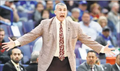  ?? Jeff Roberson / Associated Press ?? Current South Carolina coach Frank Martin is on the short list for UConn, as is...