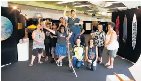  ?? Photo / Michael Cunningham ?? Te Tai Tokerau Ma¯ ori Artist Collective members and volunteers at work setting up the exhibition Toi Ngapuhi Ma¯ ori Arts Festival in 2018.