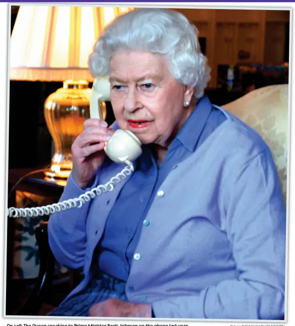  ?? Picture: BUCKINGHAM PALACE/AFP/GETTY ?? On call: The Queen speaking to Prime Minister Boris Johnson on the phone last year