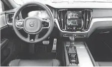  ??  ?? The Volvo S60 features a nine-inch touch screen infotainme­nt system.