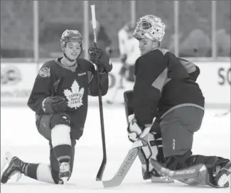  ?? TOM SZCZERBOWS­KI, USA TODAY ?? Mitch Marner is listed as day-to-day and may not be available for Saturday’s game against Ottawa.