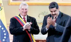  ??  ?? El presidente de Cuba, Miguel Díaz-Canel fue recibido ayer en el Palacio de Miraflores, en Caracas, por su homólogo venezolano, Nicolás Maduro.