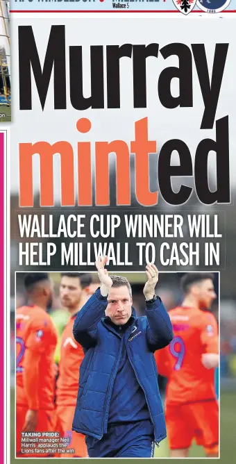  ??  ?? TAKING PRIDE: Millwall manager Neil Harris applauds the Lions fans after the win