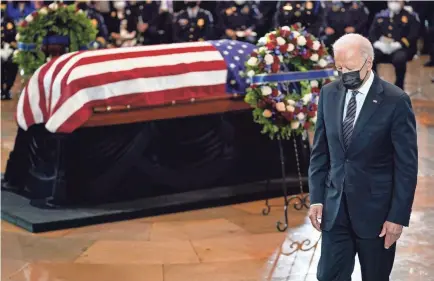  ?? J. SCOTT APPLEWHITE/POOL/AFP VIA GETTY IMAGES ?? President Joe Biden walks from the podium after speaking during a ceremony to honor slain U.S. Capitol Police Officer William “Billy” Evans as he lies in honor at the Capitol on Tuesday.