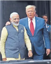  ?? PHOTO: REUTERS ?? Taking New Delhi’s ties with the US to new heights, Prime Minister Narendra Modi on Sunday endorsed US President Donald Trump for a second term, saying ‘ abki baar Trump sarkaar’ in front of nearly 50,000 Indian-americans at the Howdy Modi! event in Houston