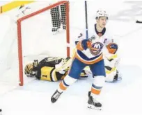  ?? Reuters ?? New York Islanders’ Jordan Eberle celebrates after scoring against Pittsburgh Penguins goaltender Casey Desmith during their NHL game.