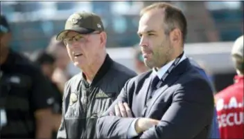  ?? PHELAN M. EBENHACK — THE ASSOCIATED PRESS FILE ?? Jaguars general manager David Caldwell, right, and executive vice president of football operations Tom Coughlin watch warmups Sunday in Jacksonvil­le, Fla.