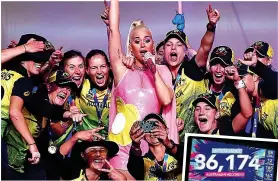  ?? GETTY IMAGES ?? Champions: Australia party with Katy Perry in front of a huge crowd