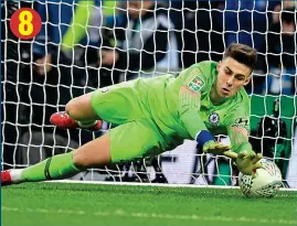  ?? ?? Kepa lets Sergio Aguero’s soft shootout penalty under him 8