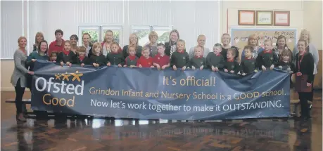  ??  ?? Staff and students at Grindon Infant School celebrate their Ofsted success.