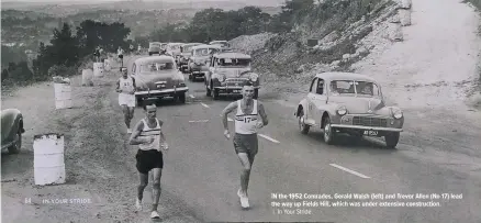  ?? | In Your Stride. ?? IN the 1952 Comrades, Gerald Walsh (left) and Trevor Allen (No 17) lead the way up Fields Hill, which was under extensive constructi­on.